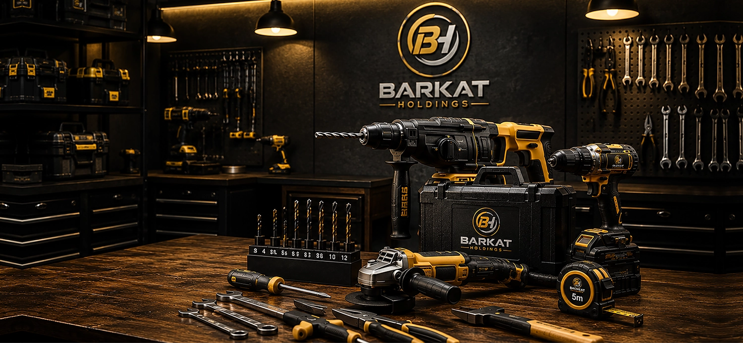 Modern industrial workshop featuring Barkat Holdings logo with professional power tools, hand tools and workshop equipment.